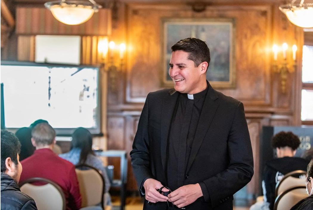 Fr. Eric Berrelleza with students